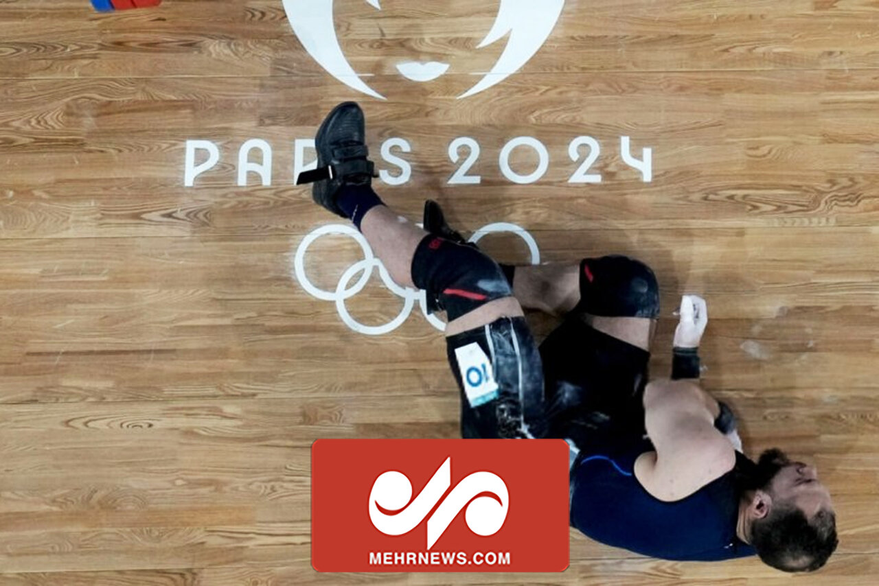 لحظه مصدومیت ورزشکار مصری در جریان مسابقه وزنه‌برداری
المپیک