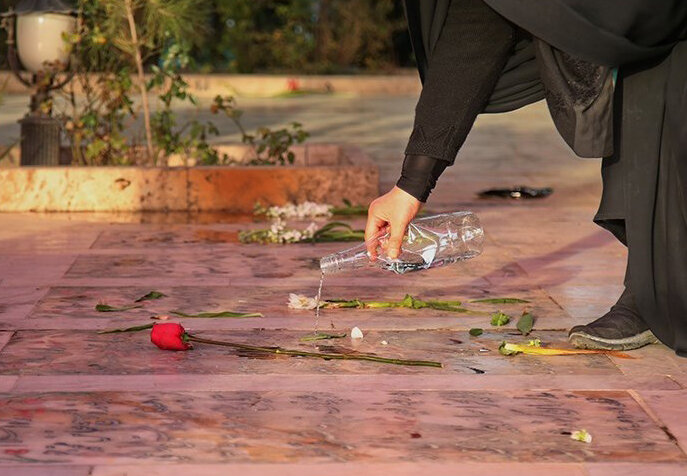 حضور وزیر کار در مراسم گل افشانی مزار شهدای کرمانشاه